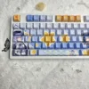 Vibrant backlit PBT keycaps showcasing magical girl theme in a dark setup