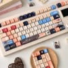 Detailed view of Caleb character-inspired legends on PBT keycaps