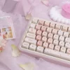 Side profile view of Cherry Blossom MOA keycaps, showing ergonomic spherical tops.
