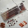 Side profile of Chocolate Cherry keycaps demonstrating the ergonomic sculpting for comfortable typing.