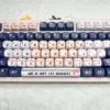 Blues Pink Voice keycaps installed on a white keyboard, illustrating the sophisticated color blend.