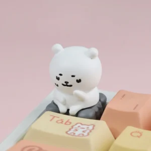 Angled view of Chiikawa Joke Bear keycap showing MX stem compatibility