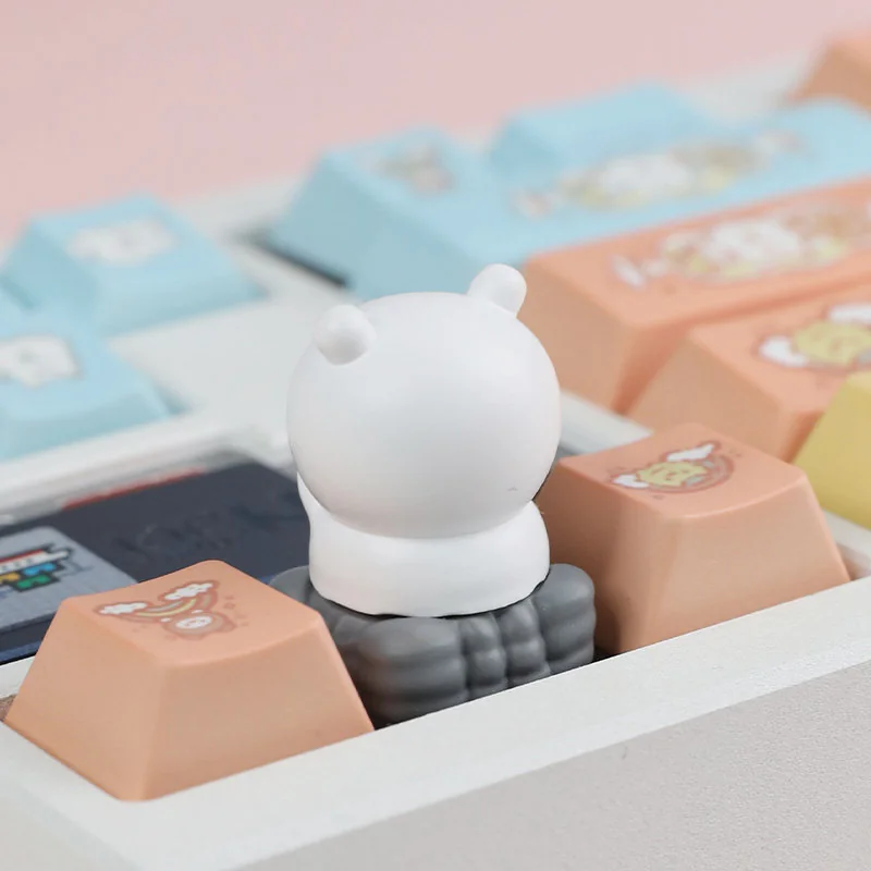 Both crying and smiling Chiikawa Joke Bear keycaps side-by-side