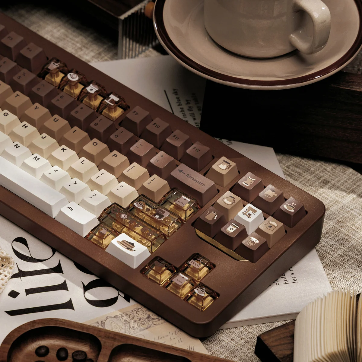 Transparent accent keycaps from the Coffee Cat set illuminated by RGB backlighting