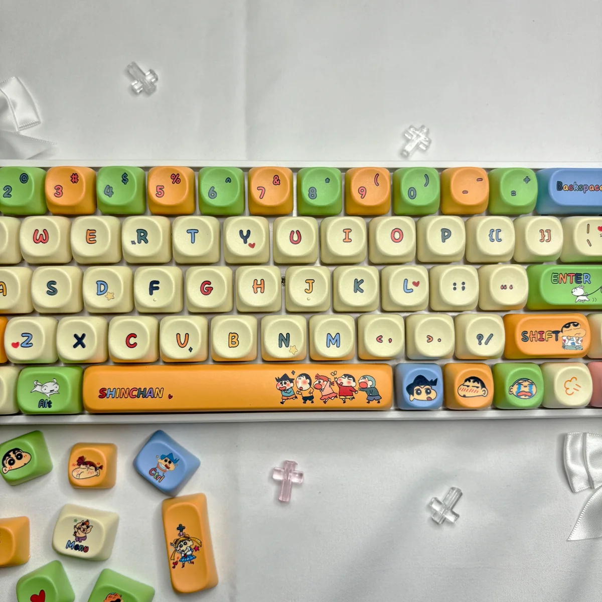 Overhead view of the full 108-key Crayon Shin-chan set, organized for layout compatibility.