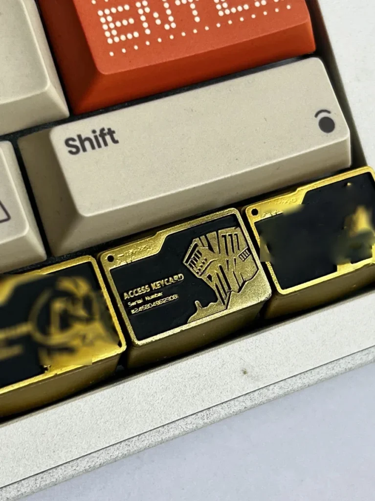 Overhead shot of the Delta Force keycap highlighting the 'Map Access Key' details and gold accents.