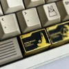 Side view of Delta Force keycap showcasing its profile and resin material texture.