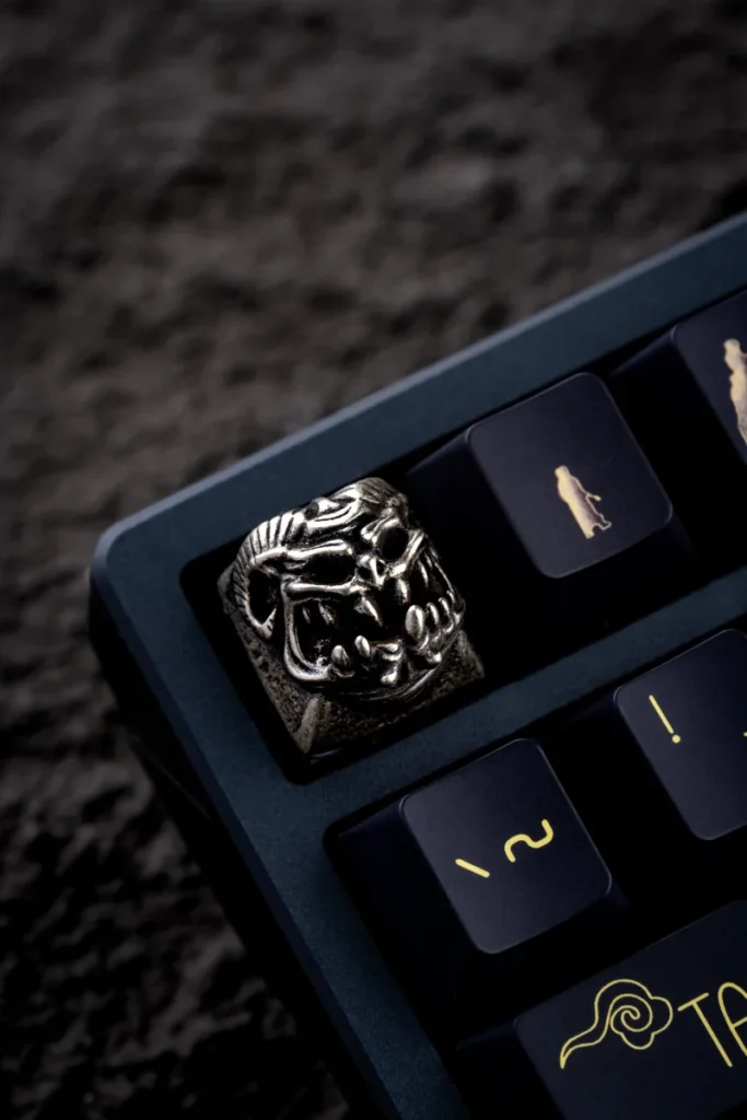 Demon Keycap crafted from copper, illustrating its weight and premium feel