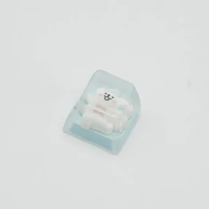 Maltese Dog artisan keycap styled on a desk with keyboard