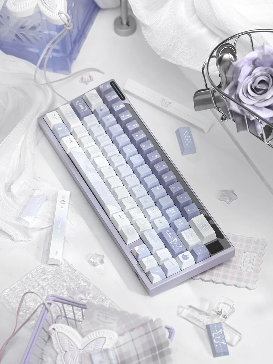 Keyboard featuring Ethereal Butterfly keycaps, paired with a matching aesthetic setup