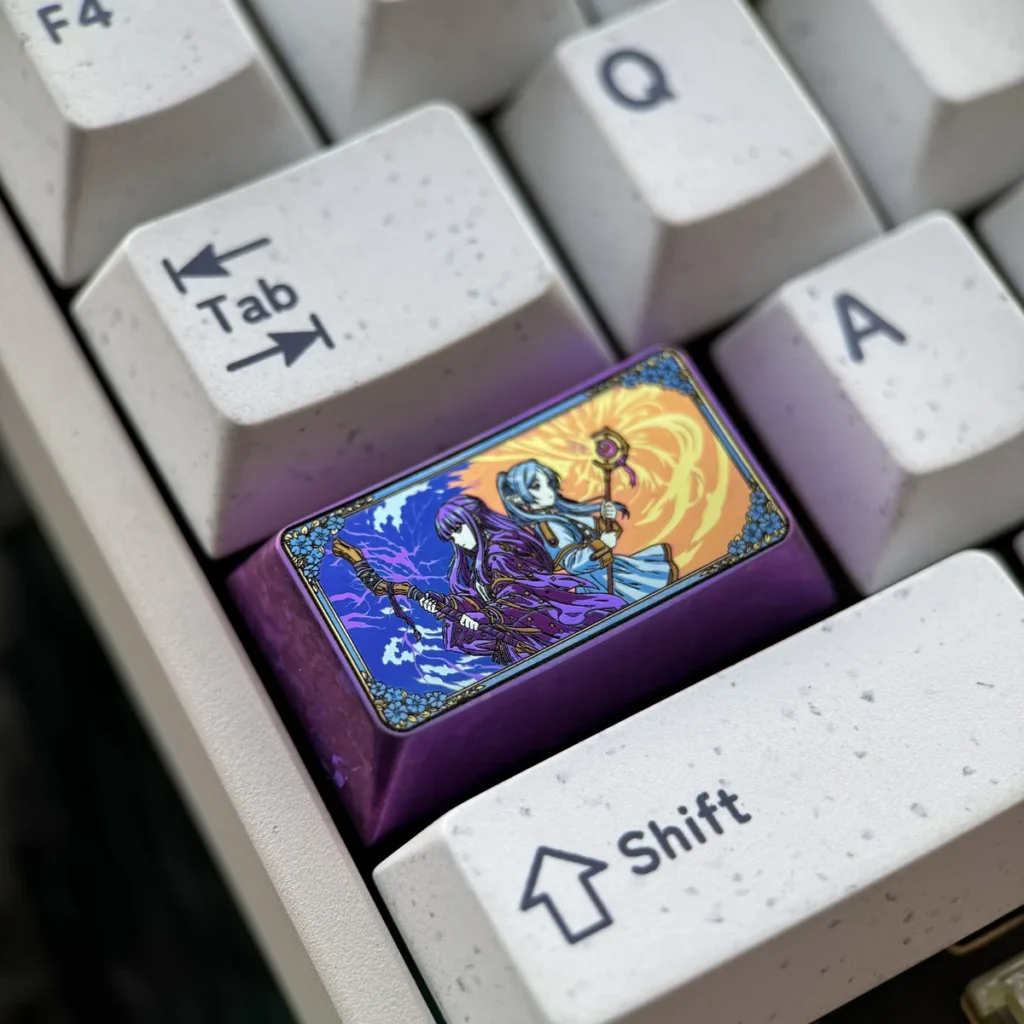 Close-up detail of the Fern character artisan keycap, highlighting the smooth titanium finish