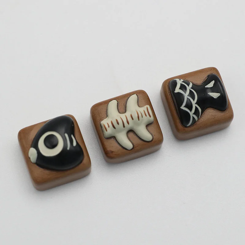 Fish Bone Head artisan keycap option showing sculpted resin details
