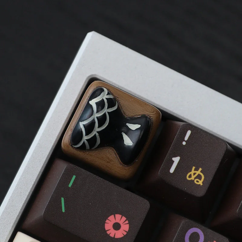 Fish Bone Tail artisan keycap option for a playful custom keyboard accent