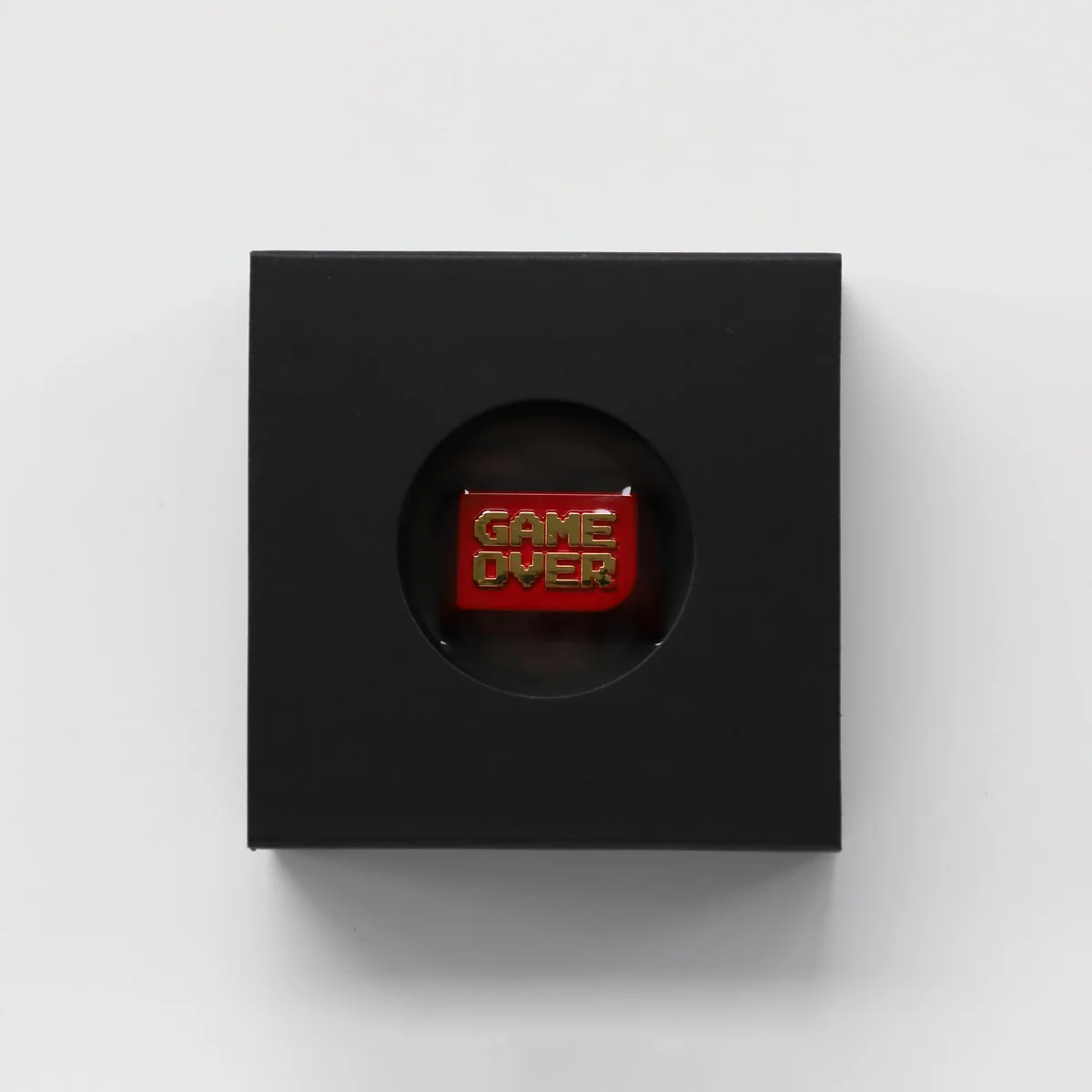 Detailed view of the Game Over keycap's side profile, highlighting its premium zinc alloy texture and Cherry profile design, installed on a gaming keyboard setup.