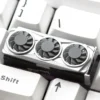 Close-up of a handcrafted resin Gaming GPU Artisan Keycap on a mechanical keyboard, showcasing intricate details.