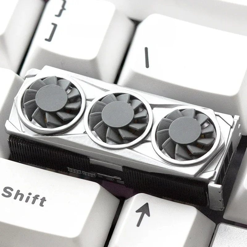 Close-up of a handcrafted resin Gaming GPU Artisan Keycap on a mechanical keyboard, showcasing intricate details.