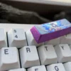Raiden Shogun Titanium Keycap installed on a keyboard, showcasing its integration and premium aesthetic
