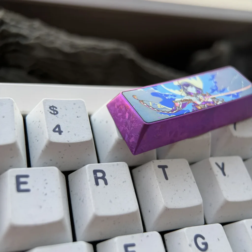 Raiden Shogun Titanium Keycap installed on a keyboard, showcasing its integration and premium aesthetic