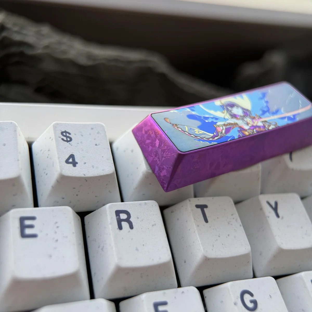 Raiden Shogun Titanium Keycap installed on a keyboard, showcasing its integration and premium aesthetic
