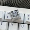 Side view of Genshin Impact titanium keycaps showing Cherry profile
