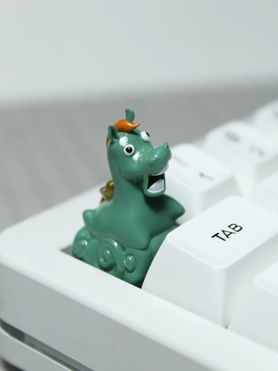 Green Pony Keycap glowing with subtle backlighting, adding to its whimsical charm