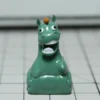 Green Pony Keycap on mechanical keyboard, showing whimsical meadow art