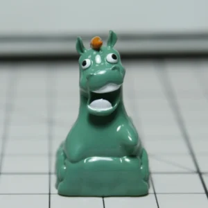 Green Pony Keycap on mechanical keyboard, showing whimsical meadow art