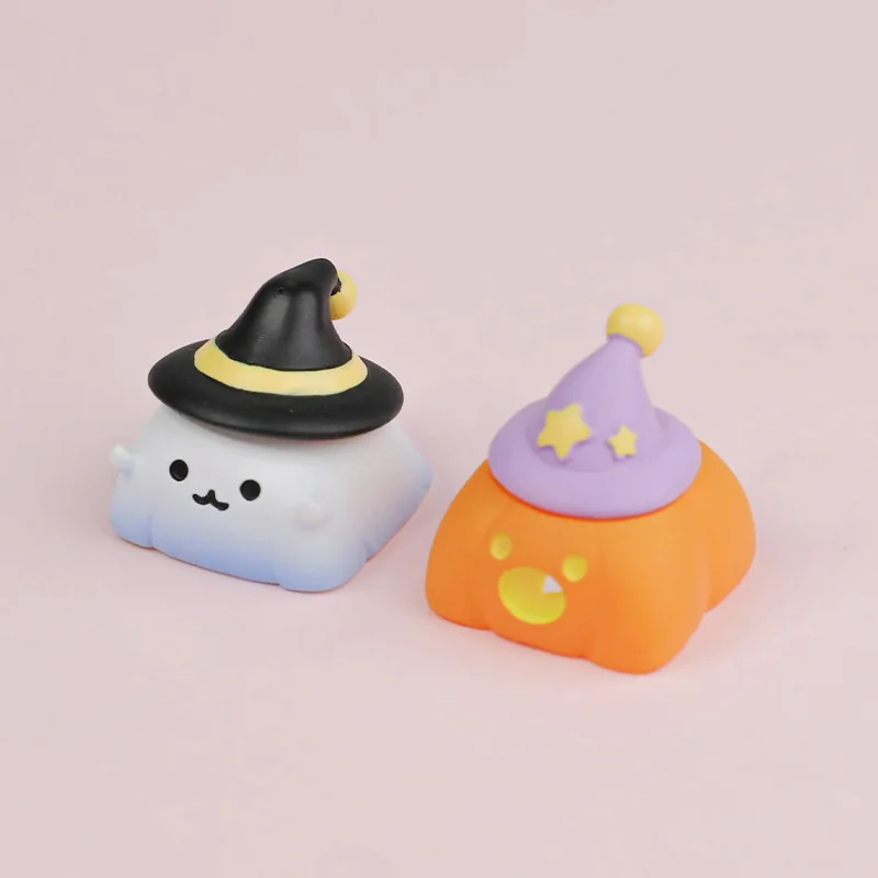 Halloween pumpkin artisan keycap in handcrafted resin on a mechanical keyboard