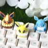 Close-up of a whimsical Jolteon Eeveelution cake-themed keycap.