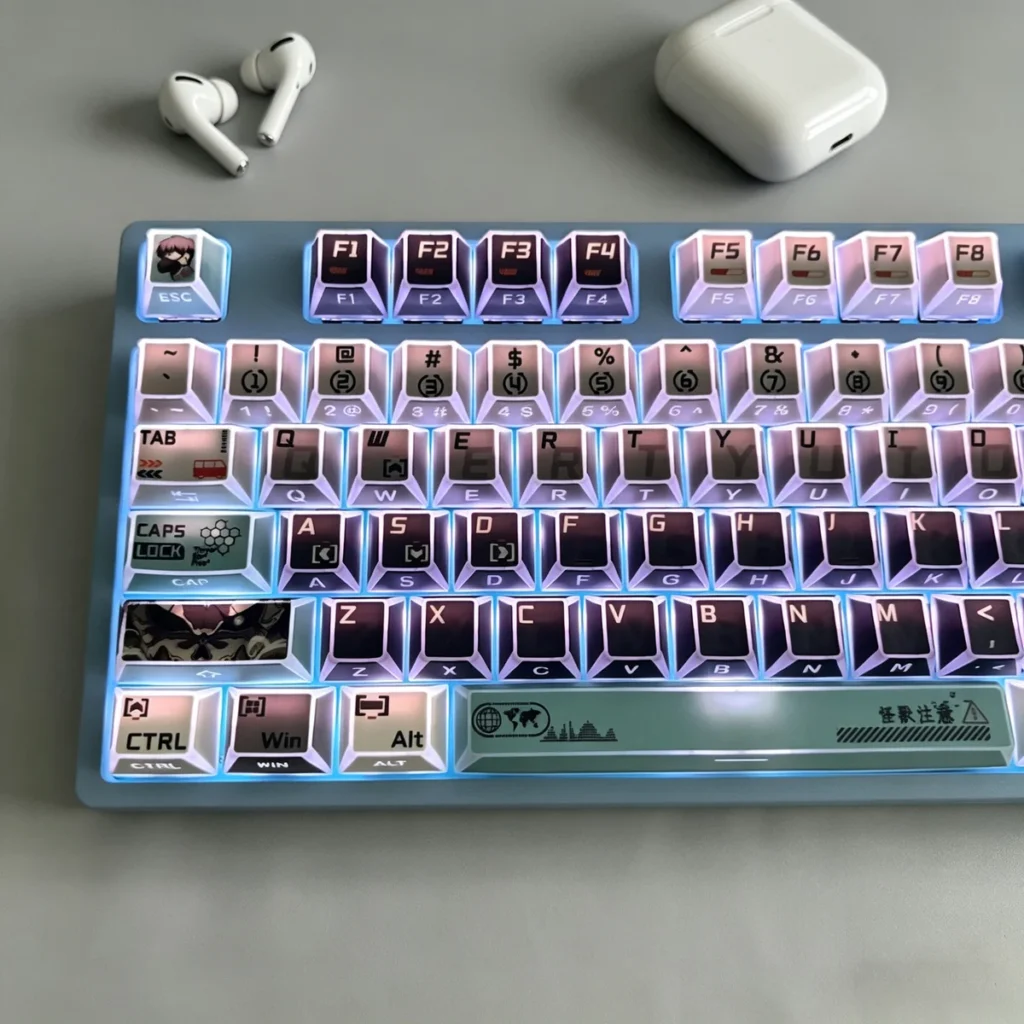 Kaiju No. 8 themed desk setup with keycaps glowing with RGB lighting