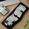 Literary-themed desk setup featuring the Literary Quest Keycap Set