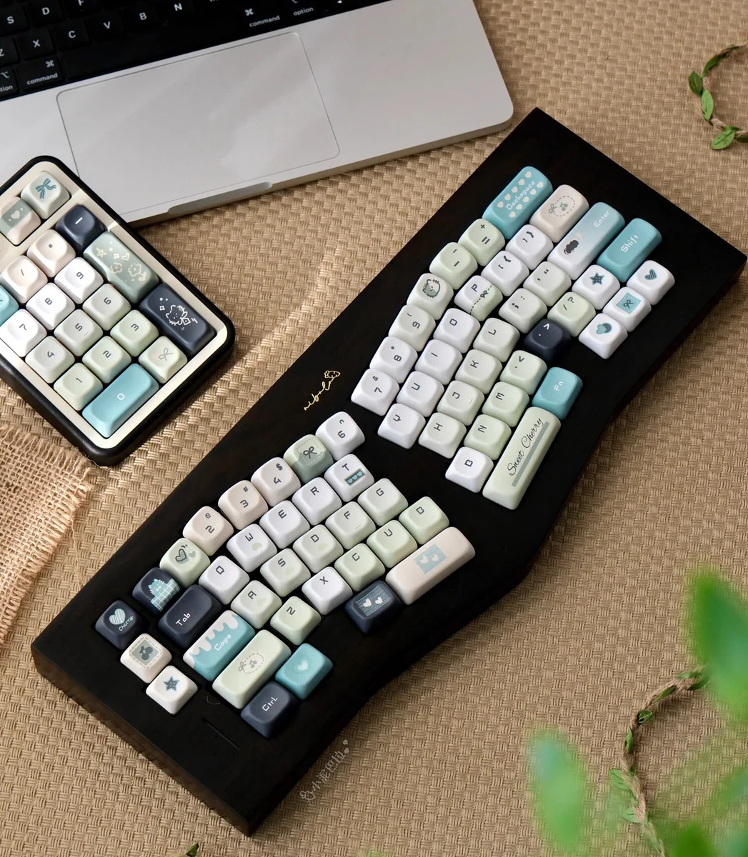 Literary-themed desk setup featuring the Literary Quest Keycap Set