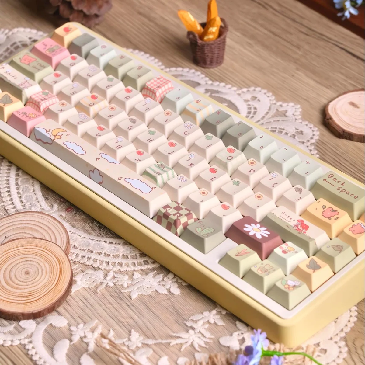 Aesthetic shot of Little Bear Forest keycaps with woodland decor