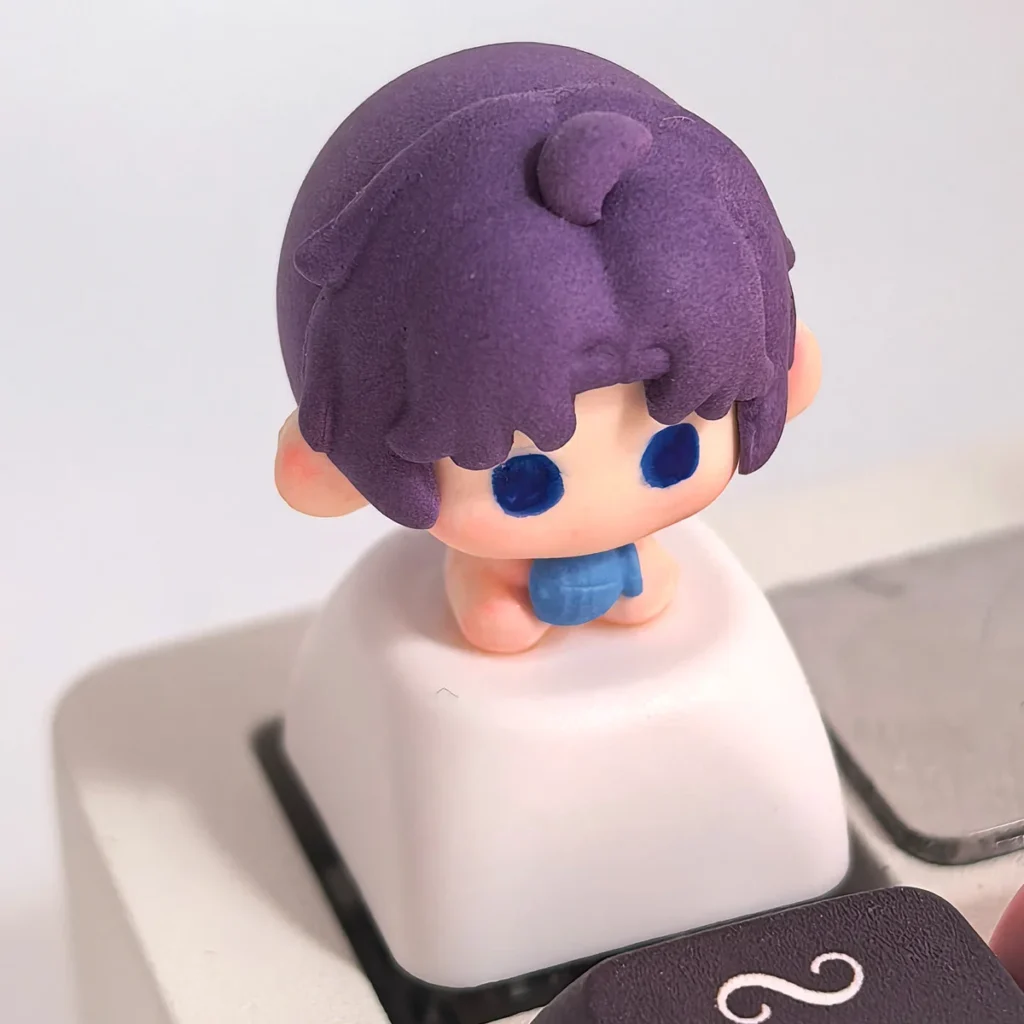 Macro shot highlighting the intricate handcrafted clay details of a game character keycap