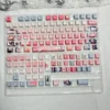 Magical Girl Witch Trials themed keycaps, including novelty keys, on a custom keyboard setup.