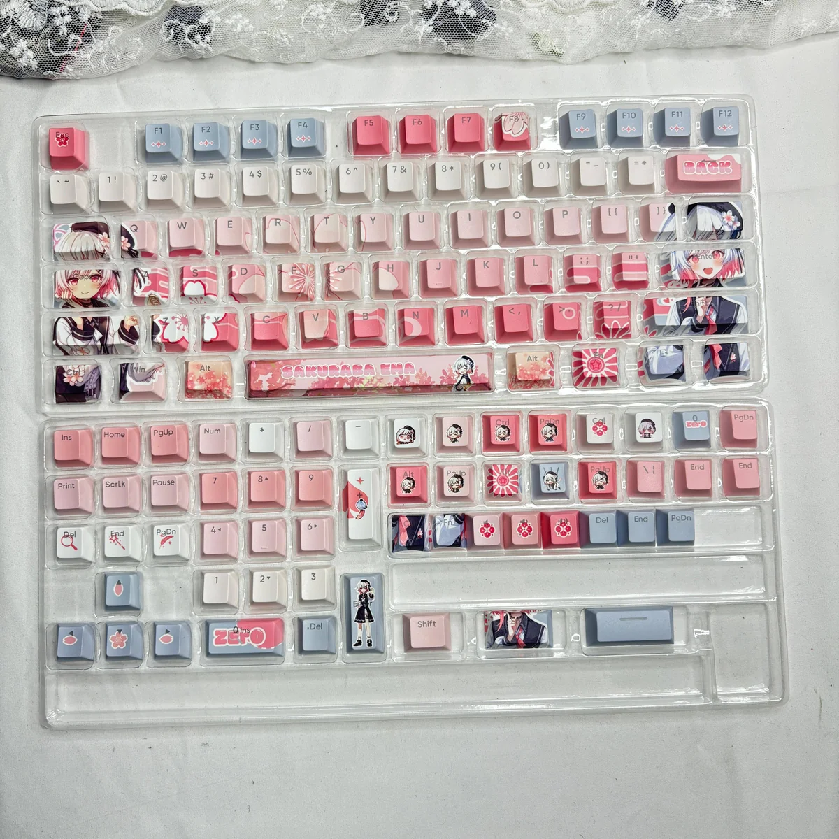 Magical Girl Witch Trials themed keycaps, including novelty keys, on a custom keyboard setup.