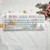 Maltese Dog Apple Keycap Set on mechanical keyboard, top-down view