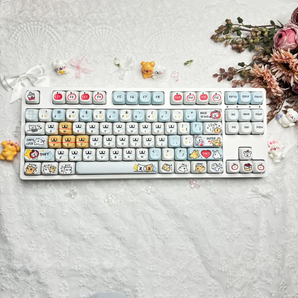 Maltese Dog Apple Keycap Set on mechanical keyboard, top-down view