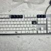 Full layout view of the 130-key Miffy keycap set on a white mechanical keyboard