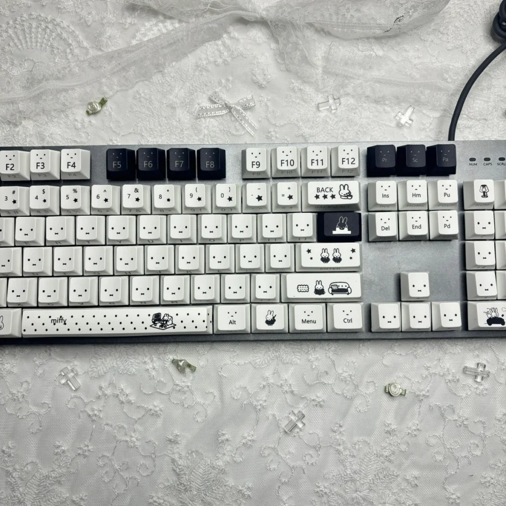 Full layout view of the 130-key Miffy keycap set on a white mechanical keyboard