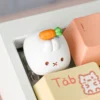 Detailed view of Miffy holding a carrot on a custom keycap