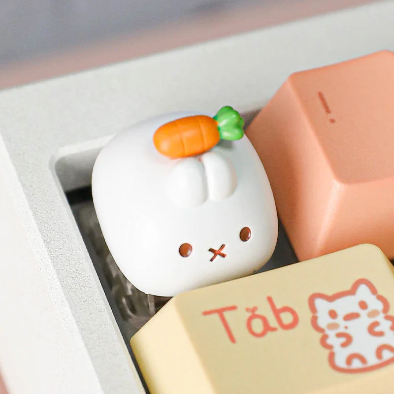 Detailed view of Miffy holding a carrot on a custom keycap