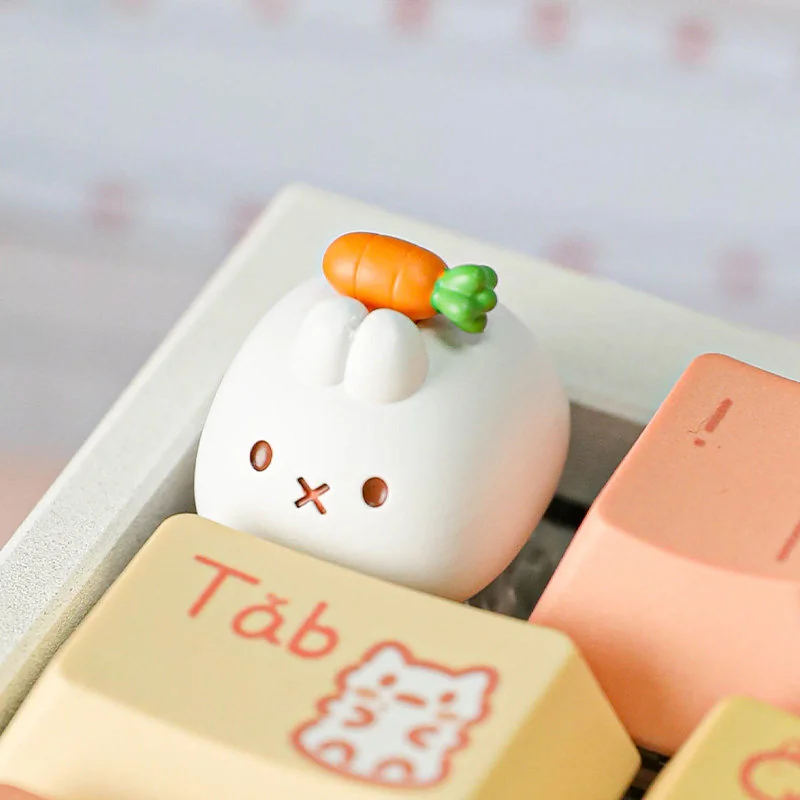 Collection of Miffy keycaps including the carrot design