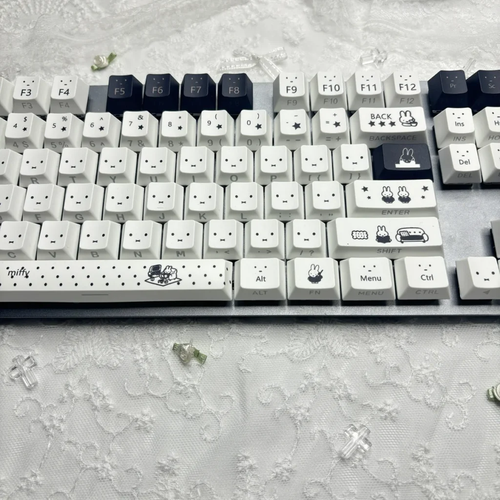 Close-up of Miffy keycaps showing side-printed shine-through legends and Cherry profile