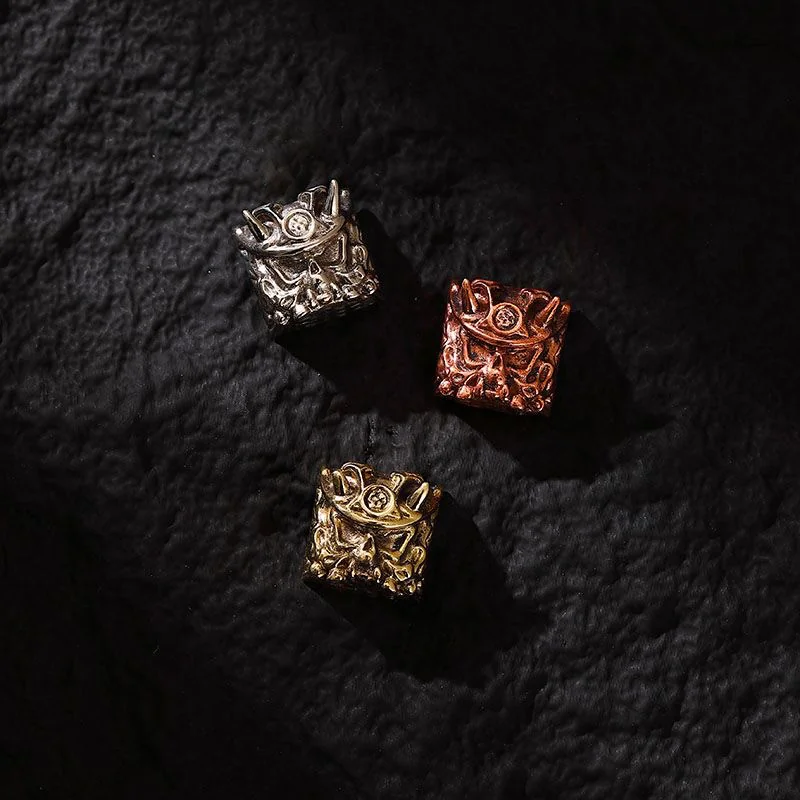 Side view of the Brass Oni Warrior keycap, highlighting its profile.