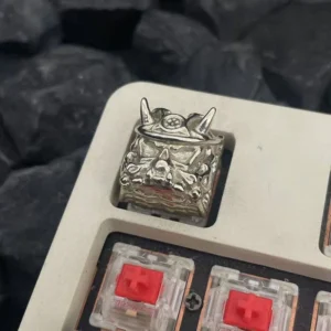 Oni Warrior keycap illuminating under keyboard backlighting, showing texture.