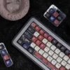 Close-up of Light and Night Osborn character art on PBT keycaps