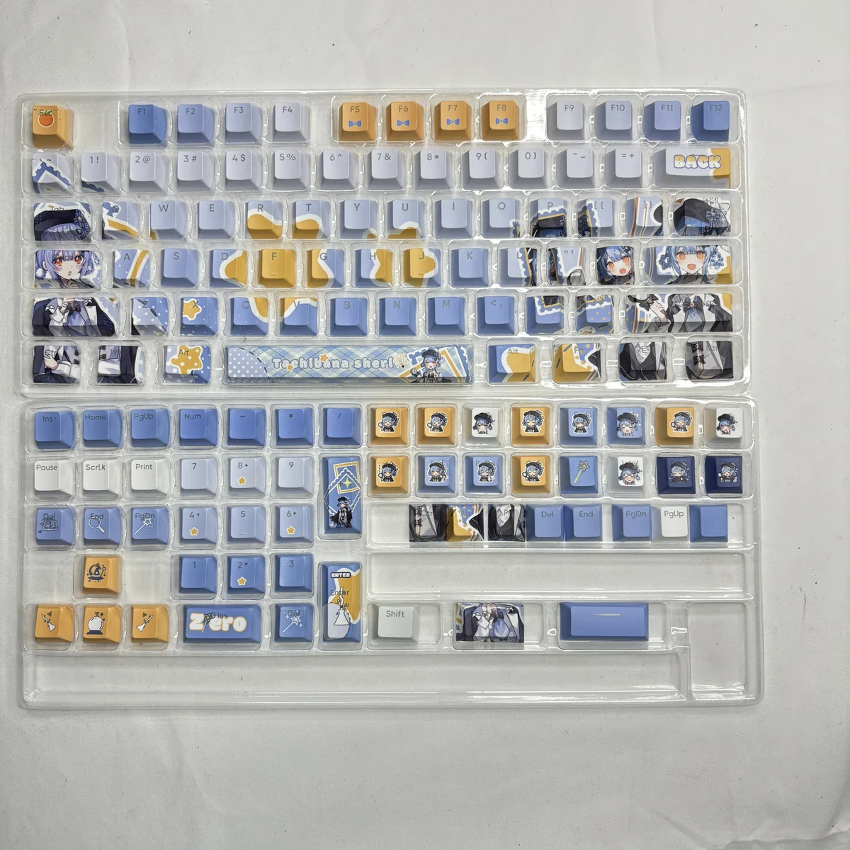 Ergonomic Cherry profile PBT keycaps with unique anime design