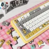 Close-up of PBT MDA profile keycaps with dog designs