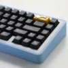Side view of Pikachu keycap showing profile